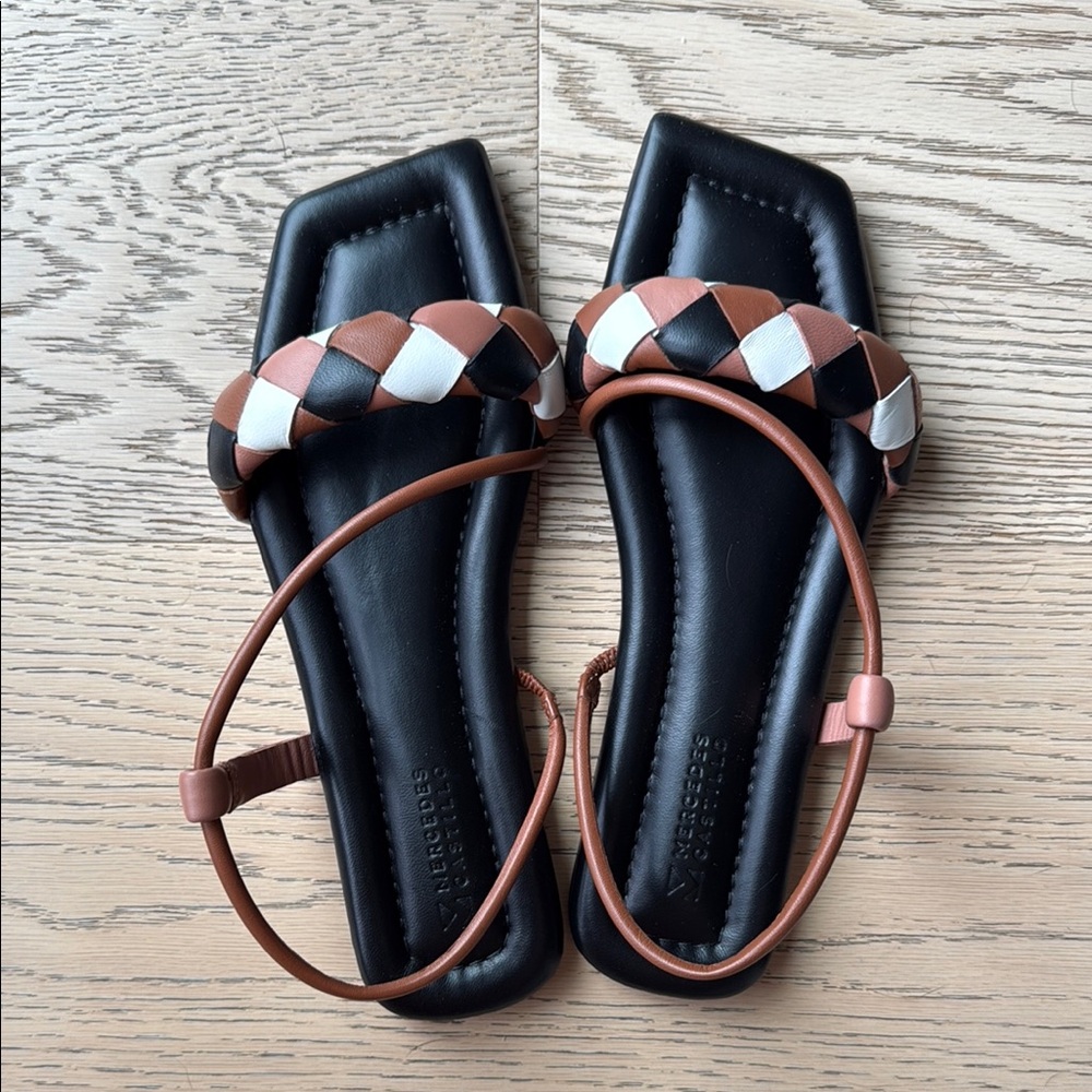 Black and Brown Minimalist Sandals

Cos, Zara, row